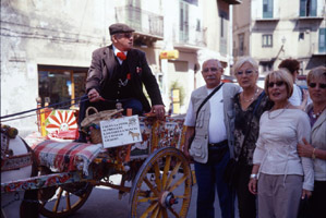 Tourists posing for family member, Monreale