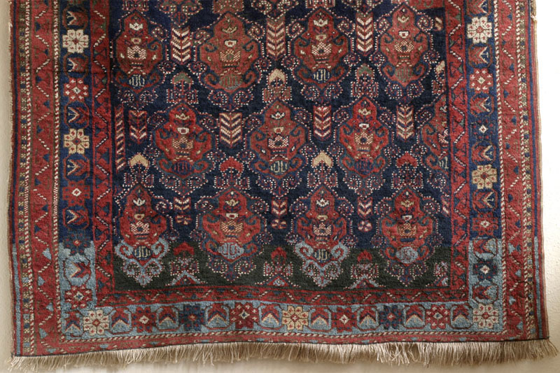 Dated Afshar rug with camel cartouche, Kerman area, south Persia around 1900: bottom half