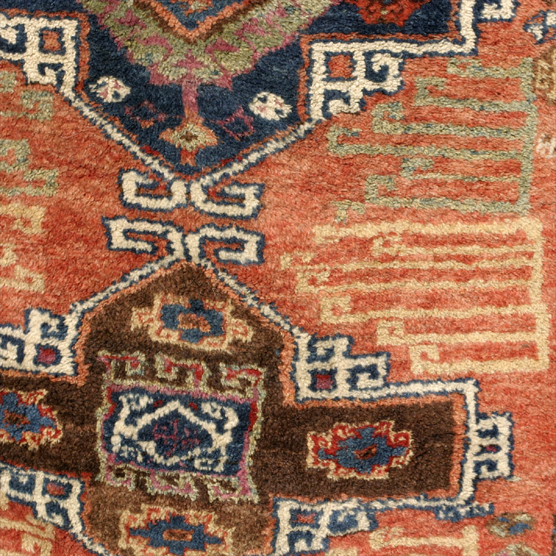 Anatolian village rug - blue and brown medallion