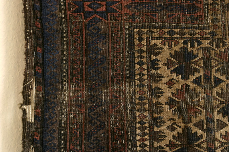 Baluch prayer rug with tree of life design, left side detail