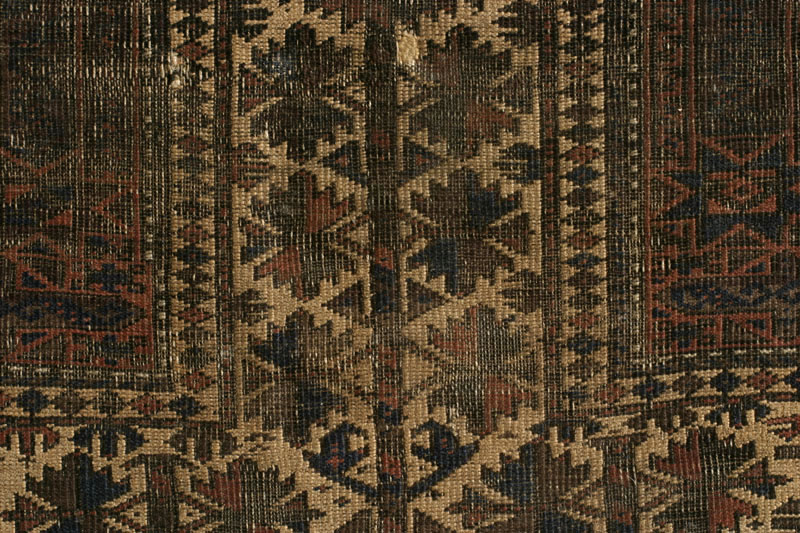 Baluch prayer rug with tree of life design, worn mirhab