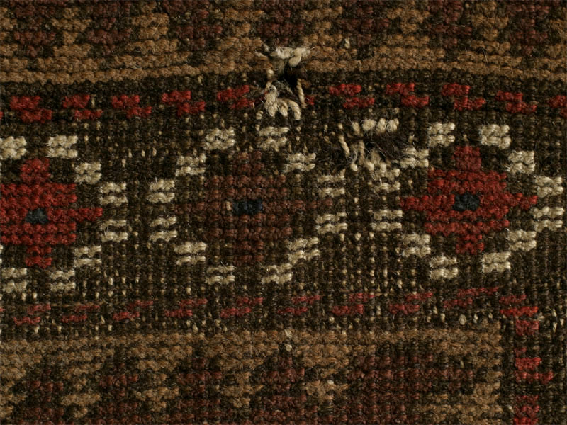 Baluch tree of life rug, small holes