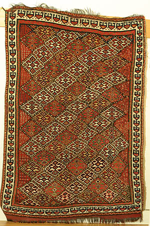 Kurdish rug with repeating pattern  - click to see enlarged view