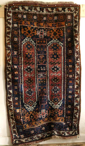 Kurdish rug, Hakkari area, east Anatolia ca. 1900-1920: full view - click to enlarge