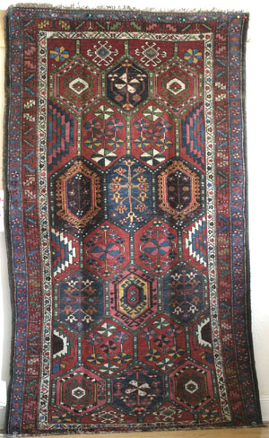 Kurdish rug with flower motives in hexagonal grid  - click to see enlarged view