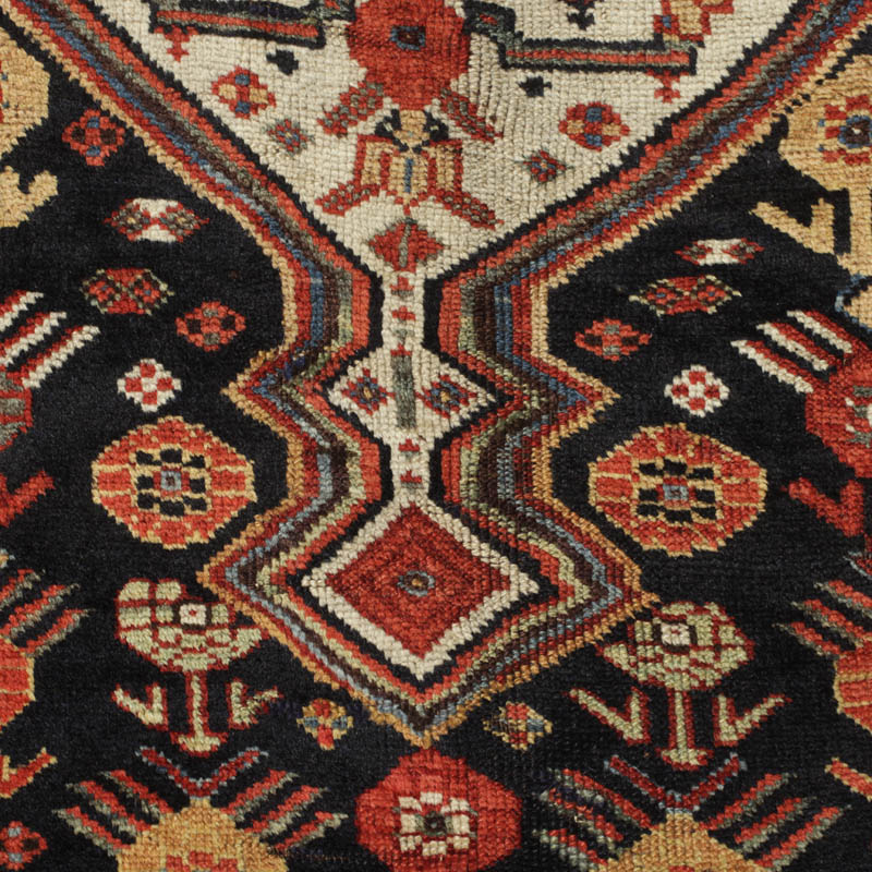Khamseh rug - lower lancet exending from medallion