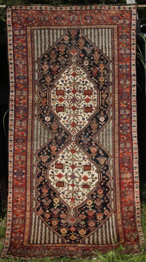 Khamseh rug with pomegranate design - opens jpg in same window