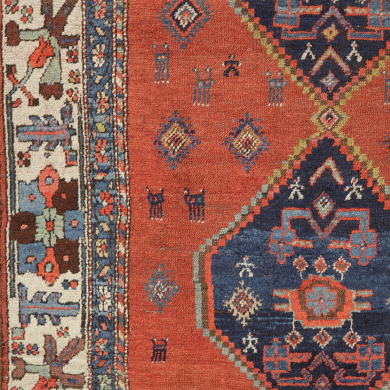 Kurdish medallion rug with humans and animals - field detail