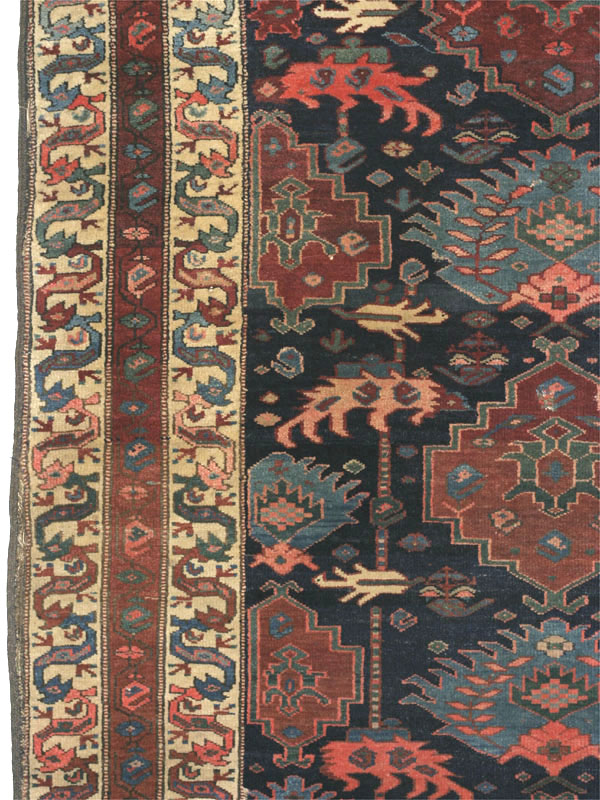 Antique north-west Persian Kurdish Palmette rug: 'dragon' borders right side