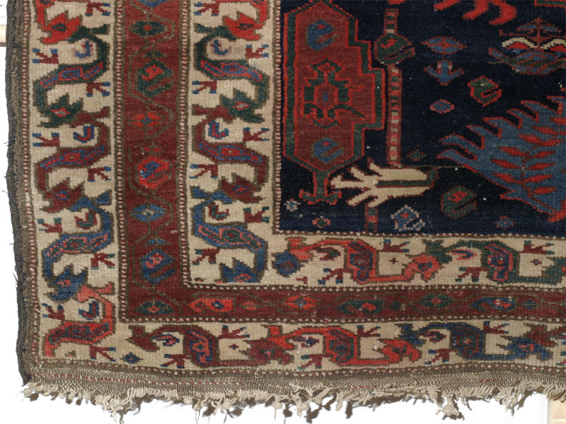 Antique north-west Persian Kurdish Palmette rug: lower left corner