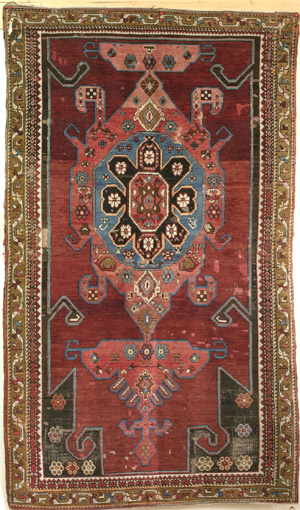 Caucasian Shirvan rug, 'honcha' (tray) medallion, ca. 1900—click to see enlarged view
