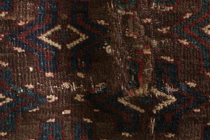 yomud turkmen rug, darned patch